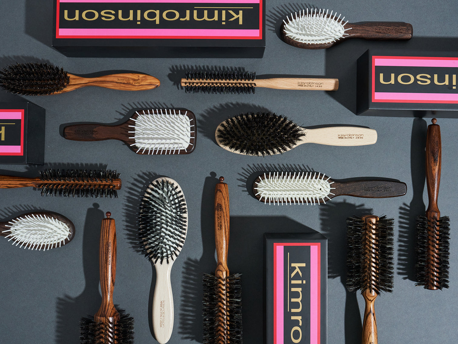 An arrangement of hair brushes aligned neatly horizontally and vertically